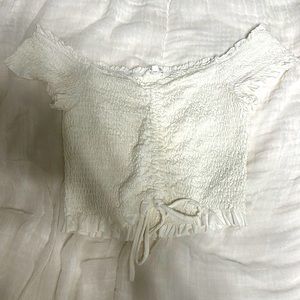 white cropped shirt with a ribbed material